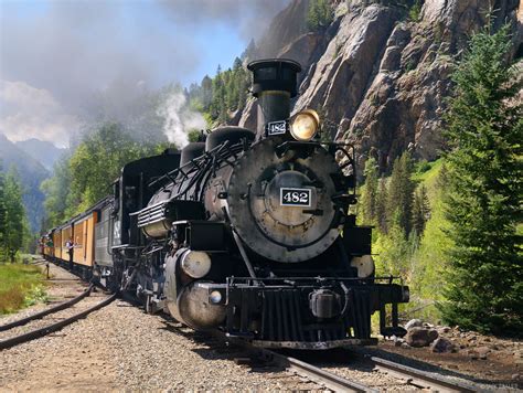 Durango and silverton narrow gauge railroad - The narrow gauge Durango-Silverton line was built in the 1880’s. The width of the rails at 36” opposed to 56” on standard rails allows the train to take sharper curves around the mountains. A regular gauge trail could not make this venture.